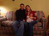 my brother and sister in law and their daughterr Ava Grace on her first christmas of '06