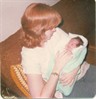 My mom and I when I was just a newborn baby