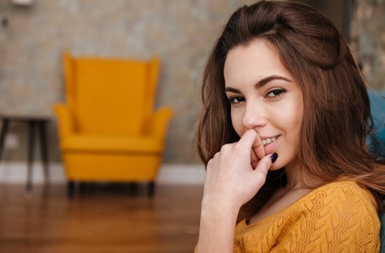 Close up portrait of a charming Ukrainian woman looking at the camera