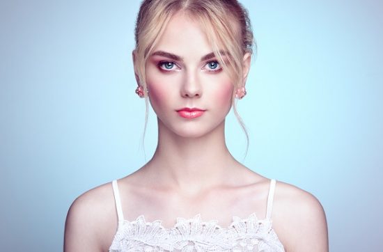 Fashionable portrait of a beautiful young Norwegian woman with blond hair