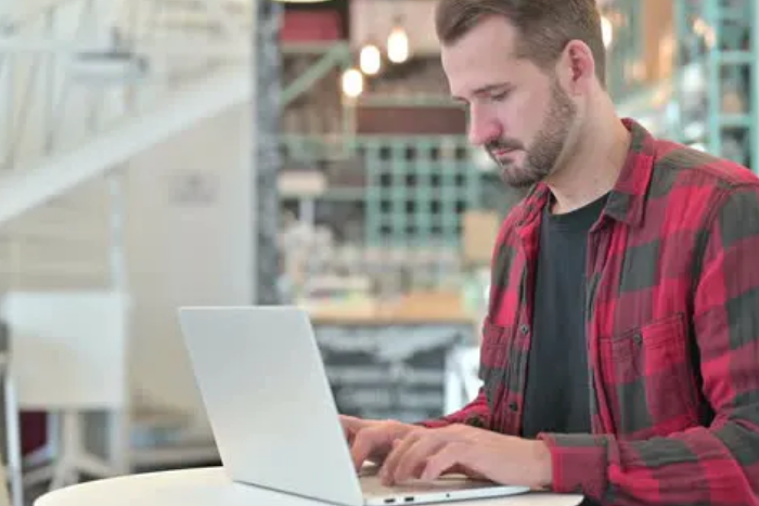 Image of a man with laptop