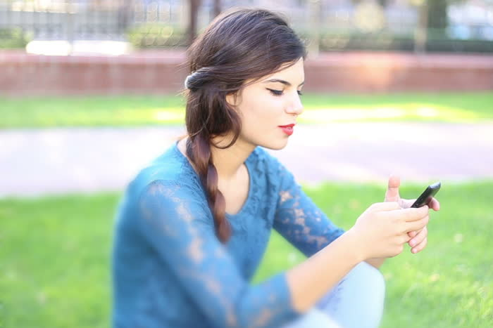 Image of woman with phone